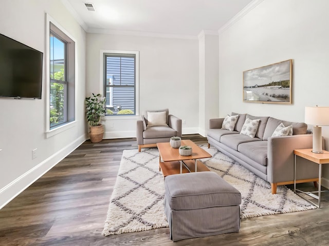 living room featuring visible vents, dark wood finished floors, crown molding, and baseboards