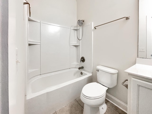 bathroom with shower / bathing tub combination, tile patterned flooring, vanity, baseboards, and toilet