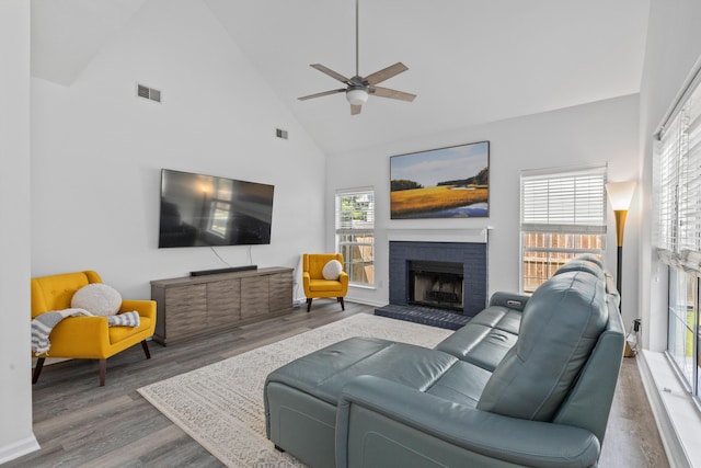 3202 Middleburry Ln, Charleston, SC 29414 - living area with high vaulted ceiling, wood finished floors, ceiling fan, and a brick fireplace