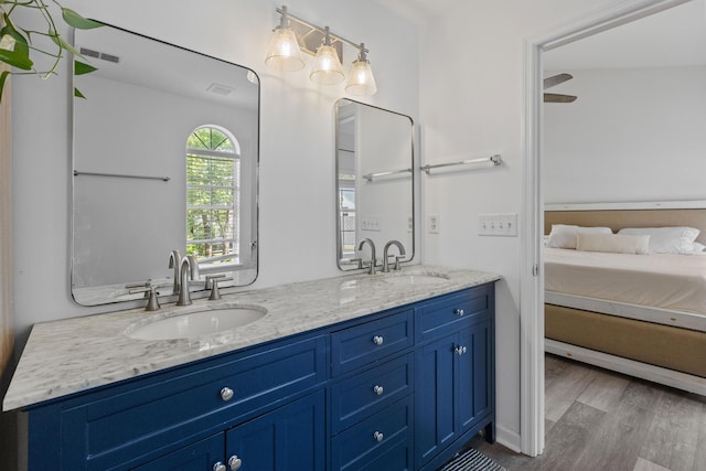 3202 Middleburry Ln, Charleston, SC 29414 - bathroom with double vanity and wood finished floors