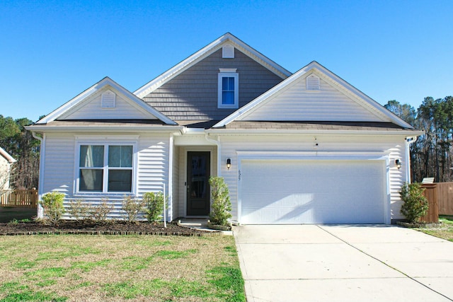 view of front of house with a garage and concrete driveway