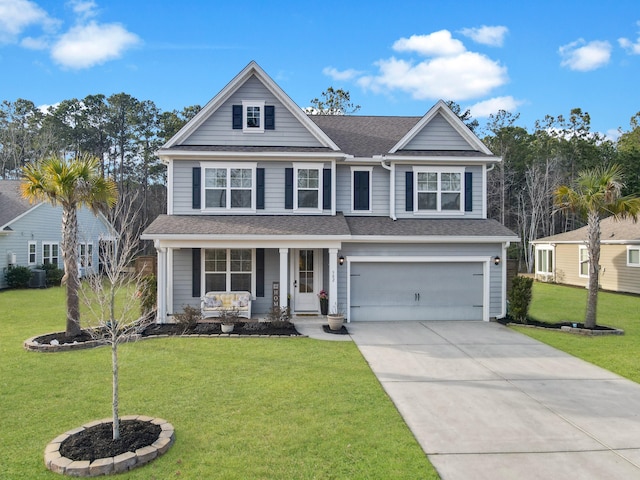 view of front of property featuring a porch, an attached garage, concrete driveway, roof with shingles, and a front lawn