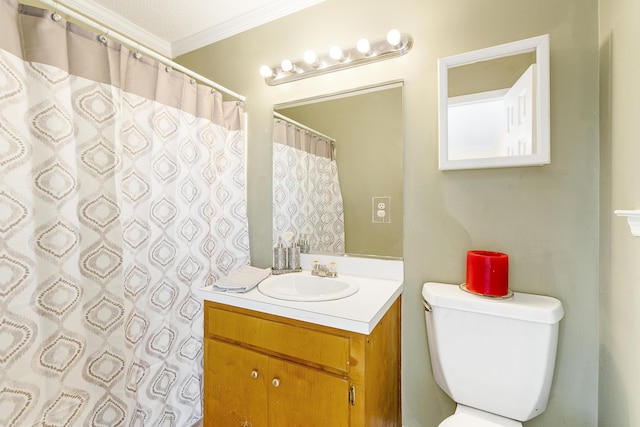 bathroom featuring crown molding, vanity, and toilet