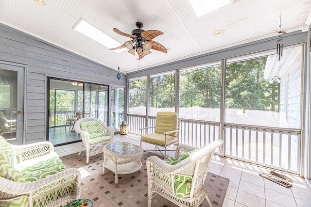 409 Santee Dr, Santee, SC 29142 - sunroom featuring vaulted ceiling, ceiling fan, a skylight, and an outdoor living space