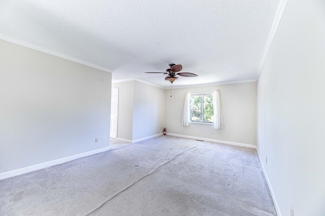 409 Santee Dr, Santee, SC 29142 - unfurnished room with a textured ceiling, ceiling fan, light colored carpet, crown molding, and baseboards