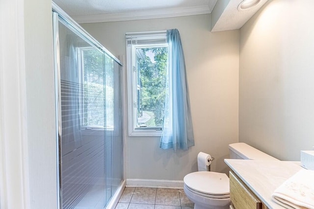 409 Santee Dr, Santee, SC 29142 - bathroom with vanity, toilet, a stall shower, tile patterned flooring, and ornamental molding