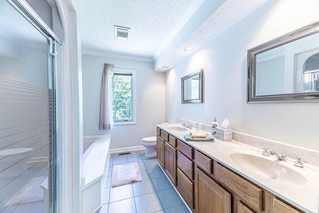 409 Santee Dr, Santee, SC 29142 - full bath featuring toilet, double vanity, crown molding, a tub, and a textured ceiling