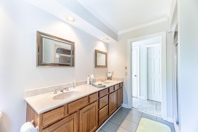 409 Santee Dr, Santee, SC 29142 - bathroom featuring ornamental molding, double vanity, tile patterned floors, and baseboards
