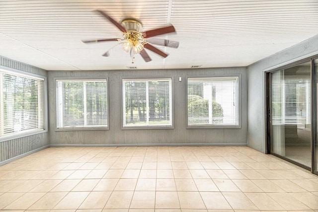 409 Santee Dr, Santee, SC 29142 - unfurnished sunroom featuring healthy amount of natural light and tile patterned flooring