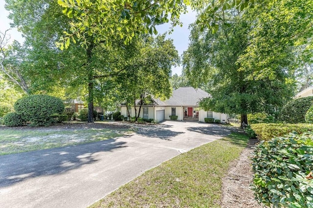409 Santee Dr, Santee, SC 29142 - obstructed view of property featuring concrete driveway and an attached garage