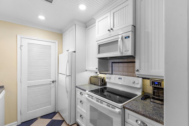 1376 Pelican Watch Villas, Seabrook Island, SC 29455 - kitchen featuring white appliances, tasteful backsplash, white cabinetry, recessed lighting, and light floors
