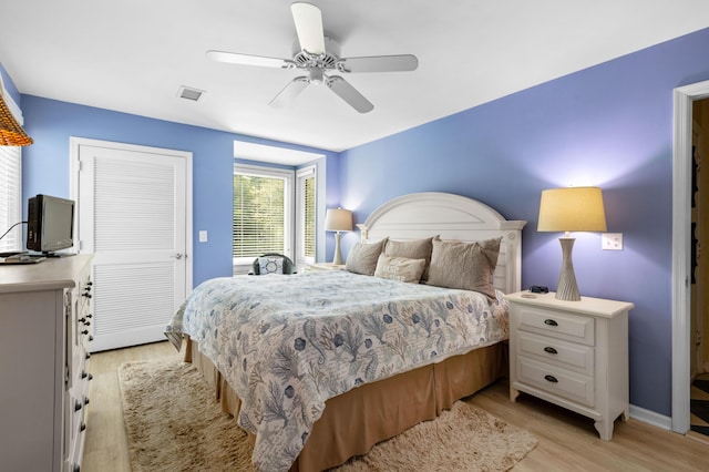 1376 Pelican Watch Villas, Seabrook Island, SC 29455 - bedroom featuring light wood finished floors, ceiling fan, and baseboards