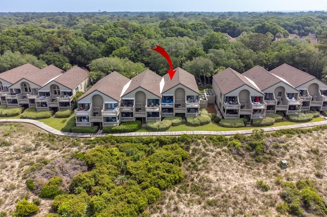 1376 Pelican Watch Villas, Seabrook Island, SC 29455 - aerial perspective of suburban area with a heavily wooded area
