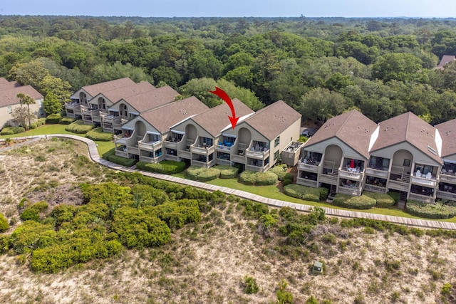 1376 Pelican Watch Villas, Seabrook Island, SC 29455 - aerial perspective of suburban area with a heavily wooded area