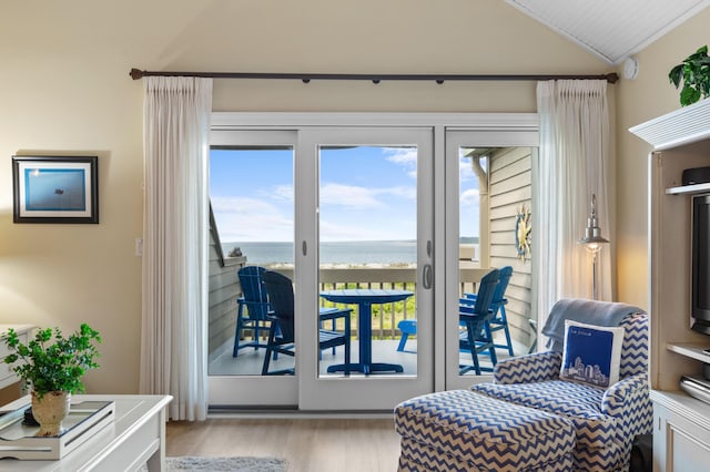 1376 Pelican Watch Villas, Seabrook Island, SC 29455 - living area with a water view, wood finished floors, and vaulted ceiling