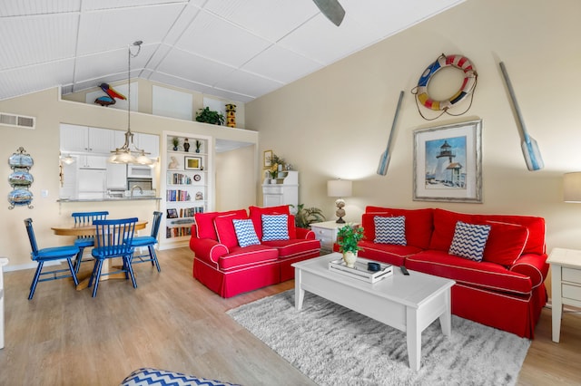 1376 Pelican Watch Villas, Seabrook Island, SC 29455 - living area with wood finished floors and vaulted ceiling