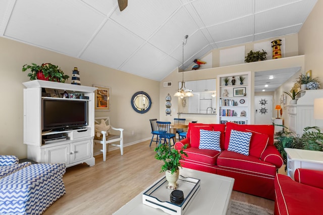 1376 Pelican Watch Villas, Seabrook Island, SC 29455 - living room with lofted ceiling, light wood finished floors, and baseboards