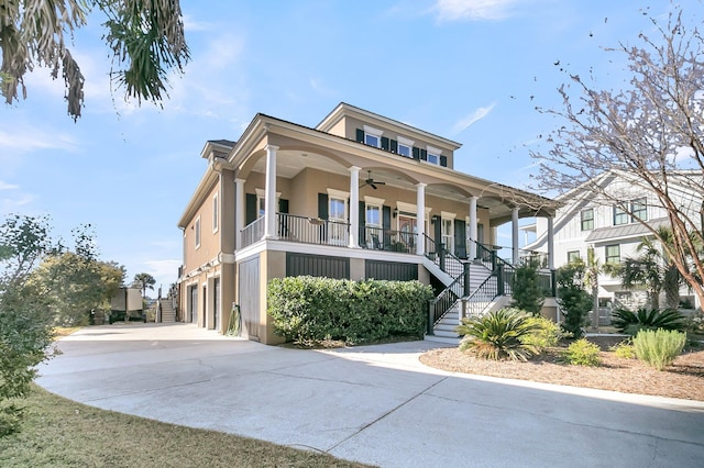 view of front of home featuring a porch and a garage