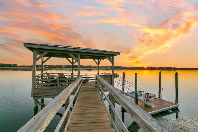 dock area with a water view