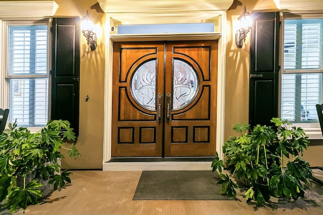 entrance to property featuring french doors