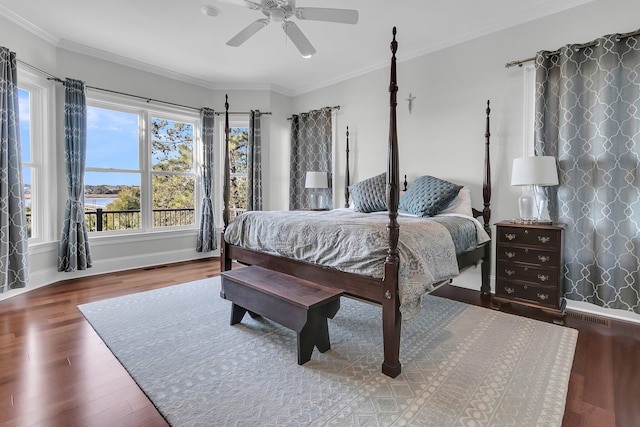 bedroom with ceiling fan, hardwood / wood-style floors, and ornamental molding