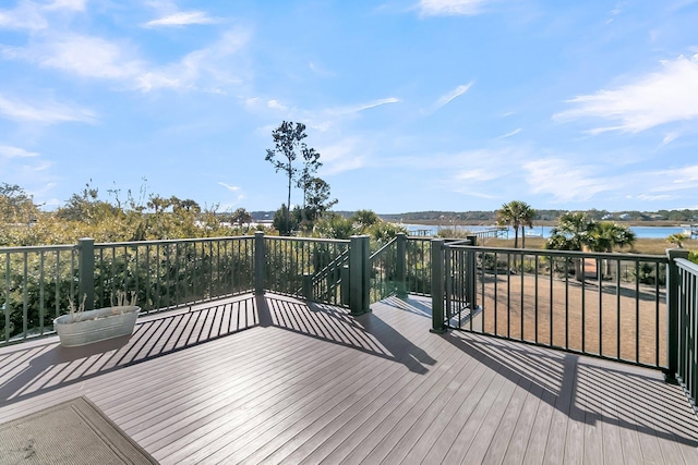 deck featuring a water view