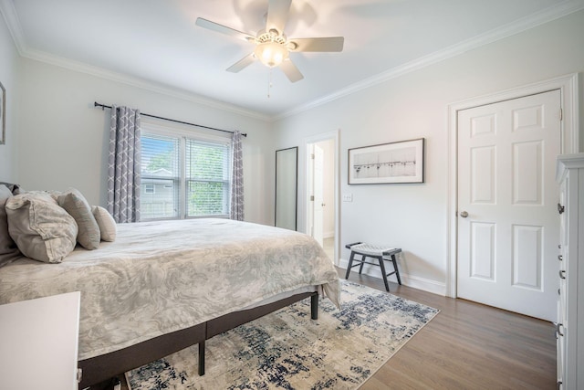 2177 Gulf Dr, Mount Pleasant, SC 29464 - bedroom with wood finished floors, crown molding, baseboards, and ceiling fan