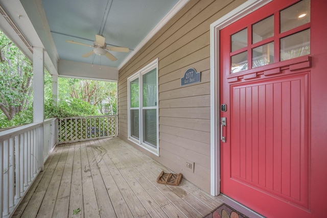 2177 Gulf Dr, Mount Pleasant, SC 29464 - wooden deck featuring ceiling fan and covered porch