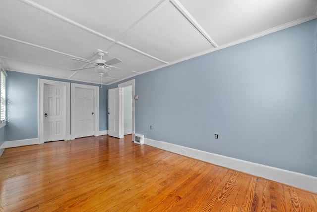 interior space featuring ceiling fan and hardwood / wood-style flooring