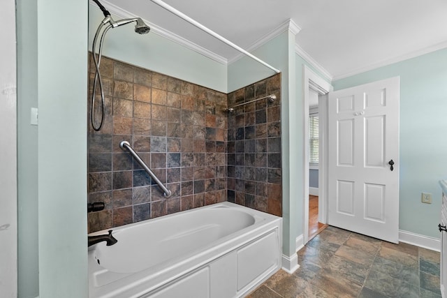 bathroom with tiled shower / bath combo and ornamental molding