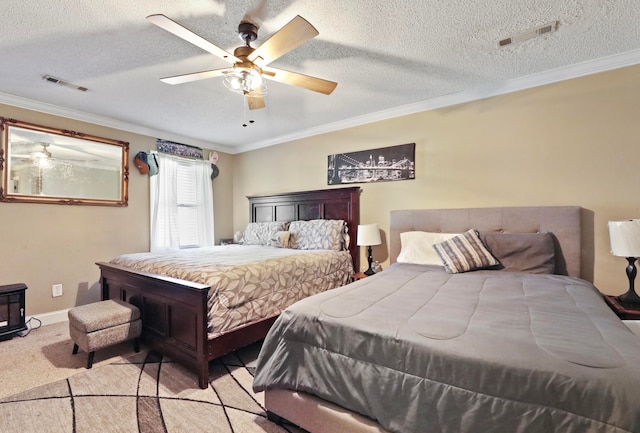 bedroom with light carpet, a textured ceiling, crown molding, and ceiling fan