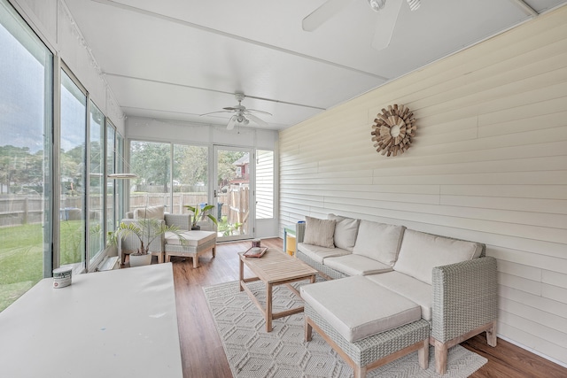 sunroom / solarium with ceiling fan