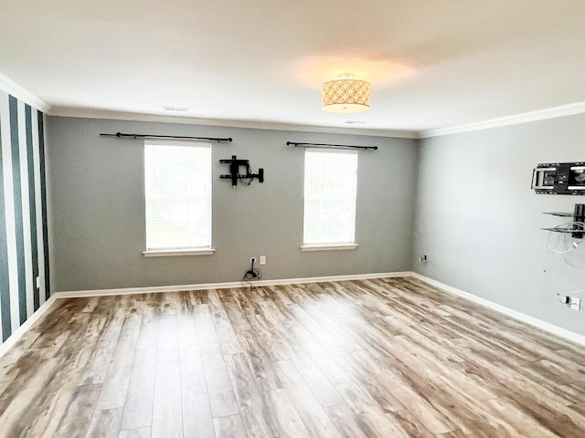 3632 Locklear Ln, Mount Pleasant, SC 29466 - spare room featuring ornamental molding, wood finished floors, and baseboards