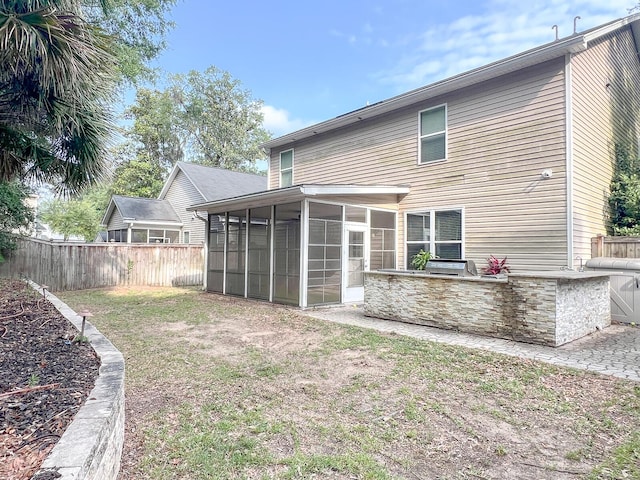 3632 Locklear Ln, Mount Pleasant, SC 29466 - rear view of property featuring a sunroom and an outdoor kitchen