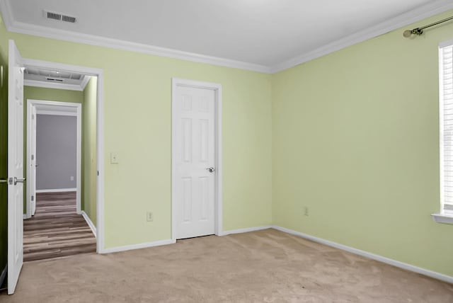 3632 Locklear Ln, Mount Pleasant, SC 29466 - unfurnished bedroom with crown molding, baseboards, and light carpet