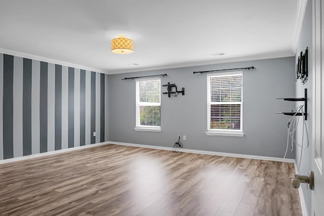3632 Locklear Ln, Mount Pleasant, SC 29466 - spare room featuring wood finished floors, crown molding, and baseboards