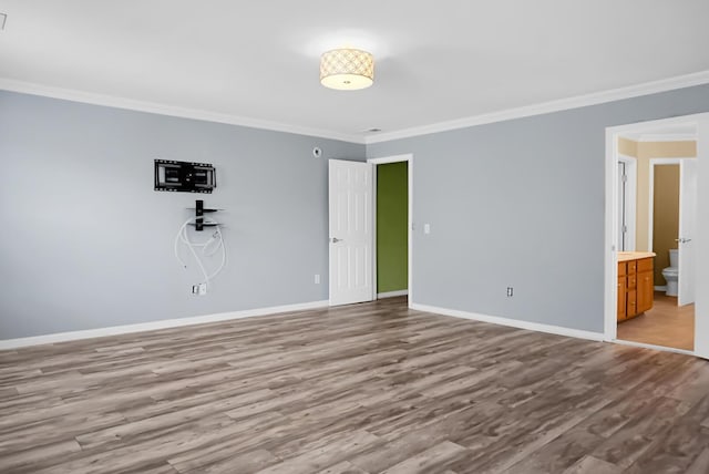 3632 Locklear Ln, Mount Pleasant, SC 29466 - unfurnished bedroom with crown molding, wood finished floors, baseboards, and ensuite bath