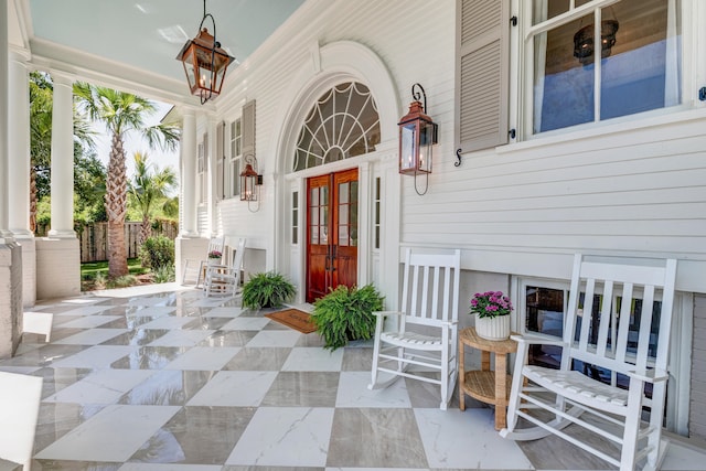 doorway to property with a porch