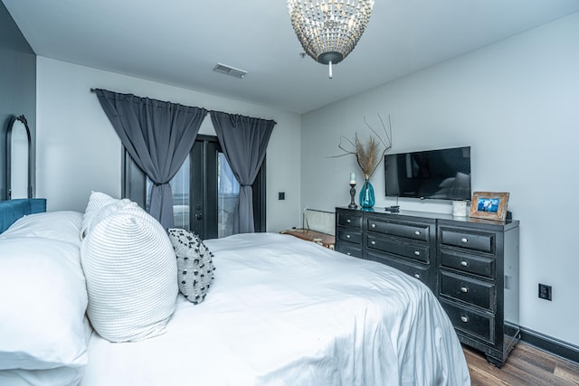 bedroom featuring wood-type flooring