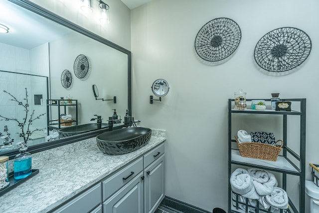 bathroom featuring vanity and walk in shower