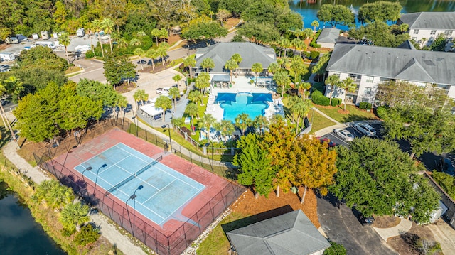 birds eye view of property featuring a water view