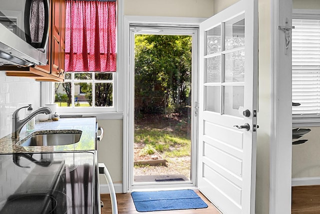 4810 Parkside Dr, North Charleston, SC 29405 - entryway featuring a sink, dark wood-style flooring, and baseboards