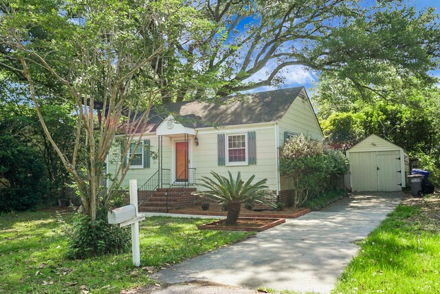 4810 Parkside Dr, North Charleston, SC 29405 - view of front of house with a shingled roof and a front yard