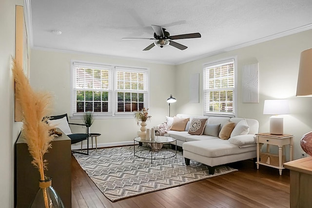 4810 Parkside Dr, North Charleston, SC 29405 - living room featuring hardwood / wood-style flooring, crown molding, a ceiling fan, plenty of natural light, and baseboards