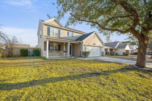 traditional-style house featuring a porch, an attached garage, fence, concrete driveway, and a front yard