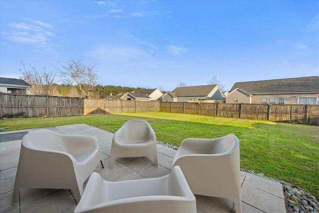 view of patio with a fenced backyard and a residential view