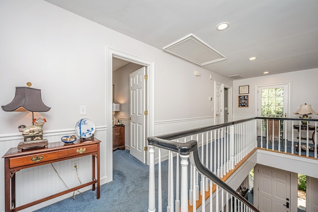 hallway featuring carpet