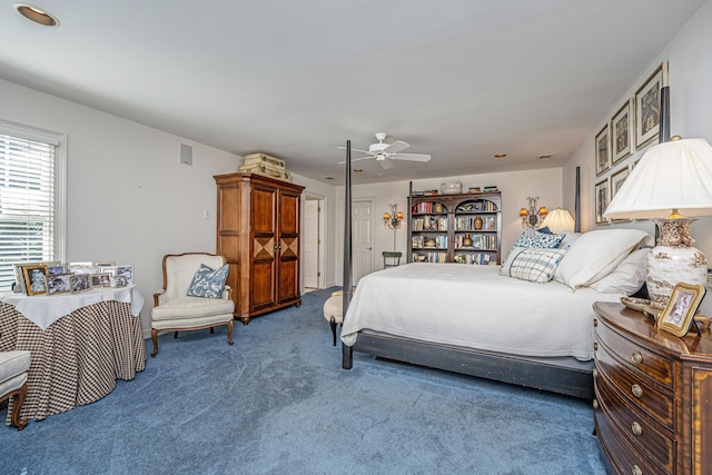 carpeted bedroom featuring ceiling fan