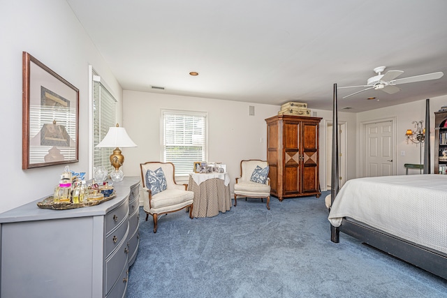 carpeted bedroom with ceiling fan