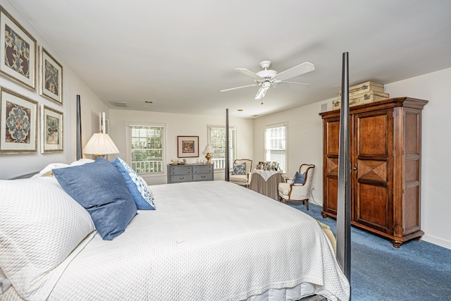 carpeted bedroom featuring ceiling fan